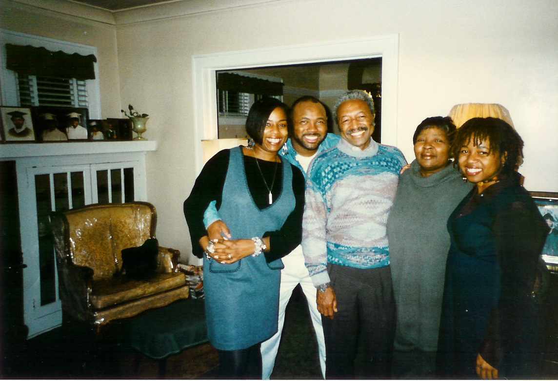 My birth family circa the early '90s: (from left) my sister, Sharon; brother, Curtis Jr.; father, Curtis Sr.; mother, Santranella; and me